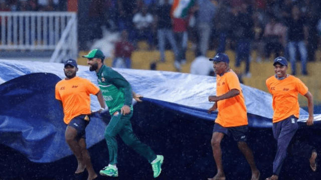 CRICCRANK - 2023-09-10T195315.200 With the arrival of rain, Fakhar Zaman jumped in joy, started helping the ground staff, took cover himself and ran away.